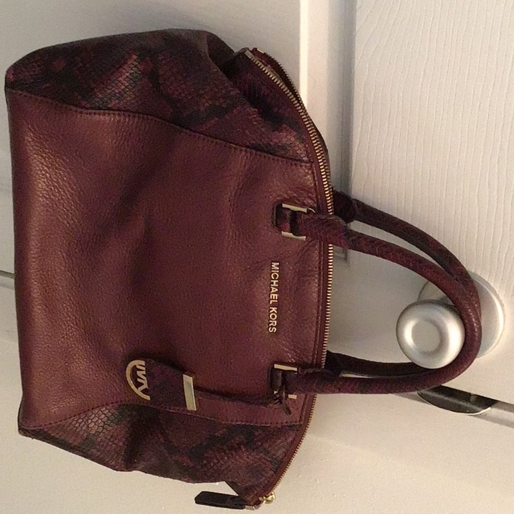 Michael Kors leather satchel. Medium size. Gently used in excellent condition.